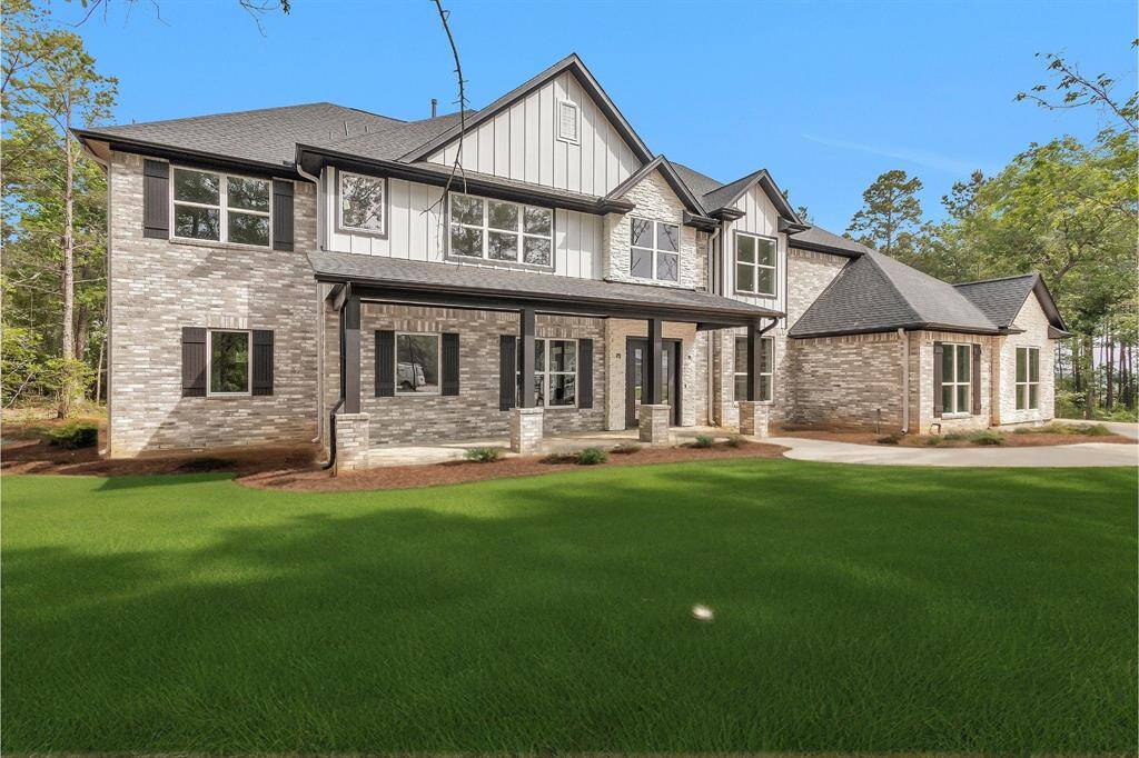 Photo has been edited to show possible landscaping. Landscaping may be different than photo.