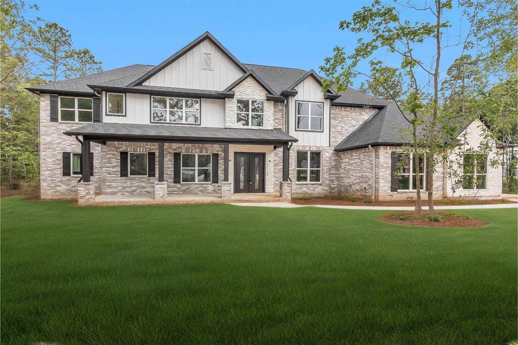 Photo has been edited to show possible landscaping. Landscaping may be different than photo.