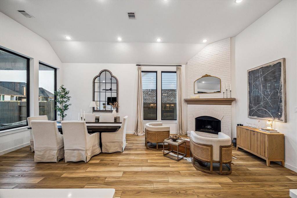 View showing this practical andelegant dining area and fireplacelounge room.