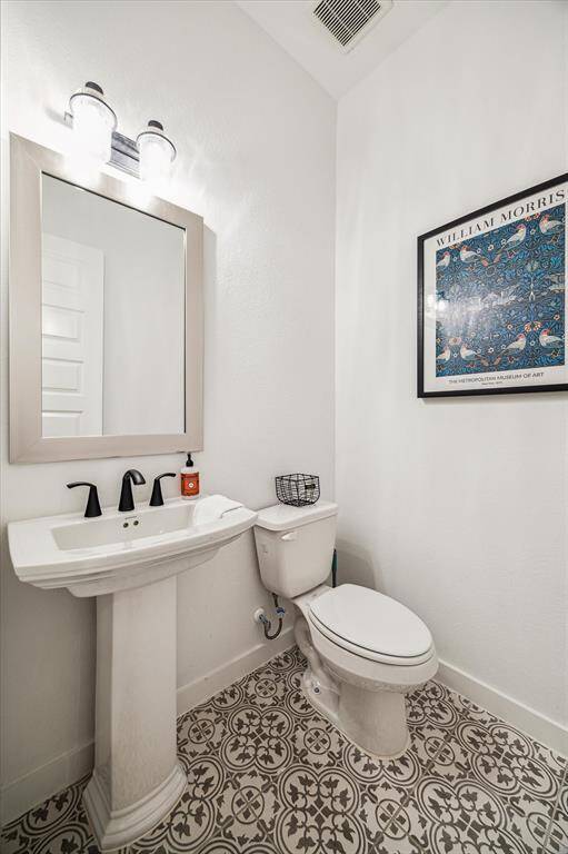 Half bathroom down the hallway.