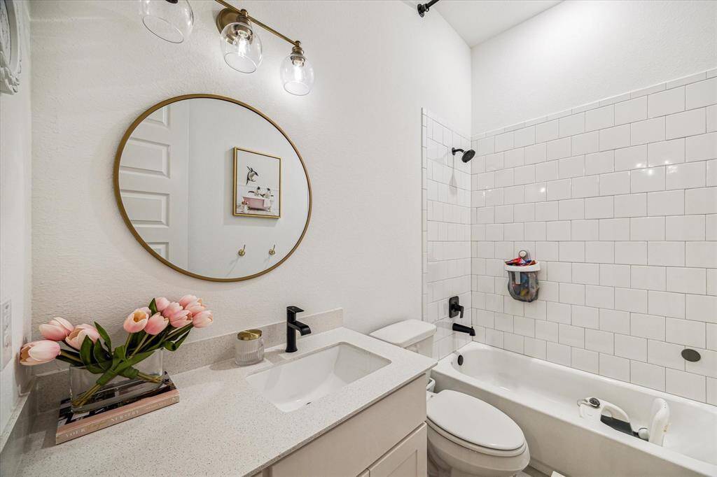 Third full bathroom thats attached to the secondary Bedroom.