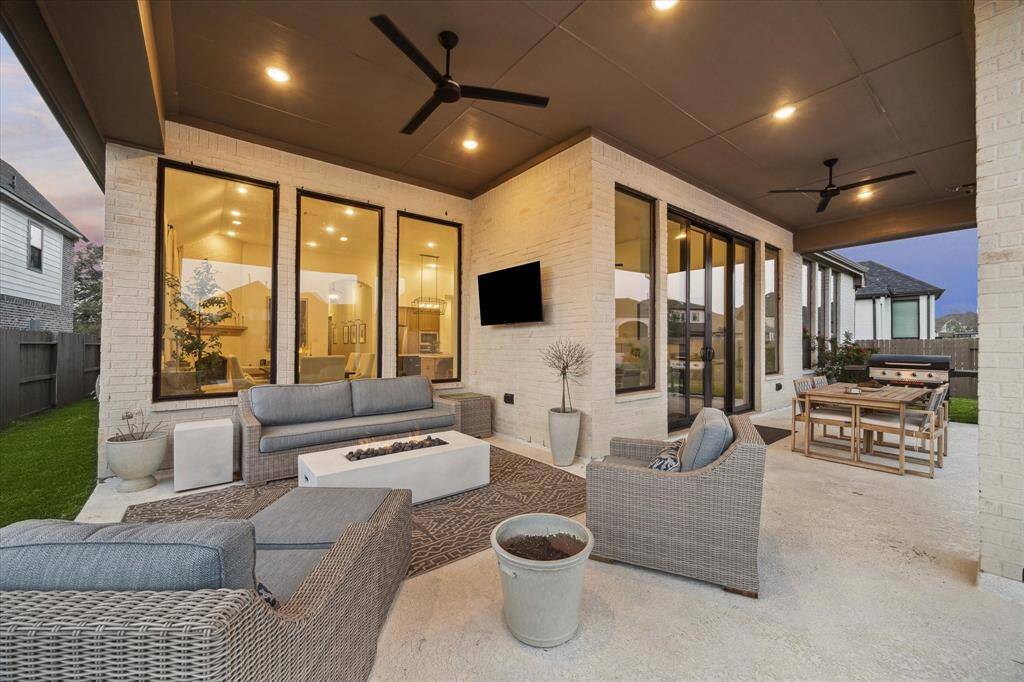 Oversized covered Patio is an upgraded design feature when home was being built
