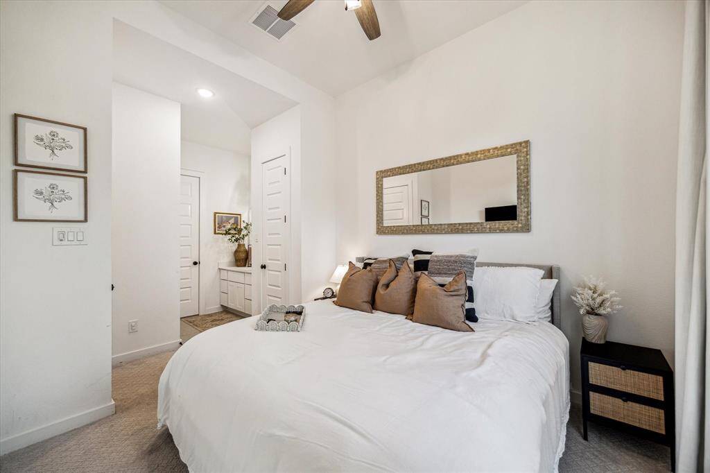 Across from the office is the firstsecondary bedrom.