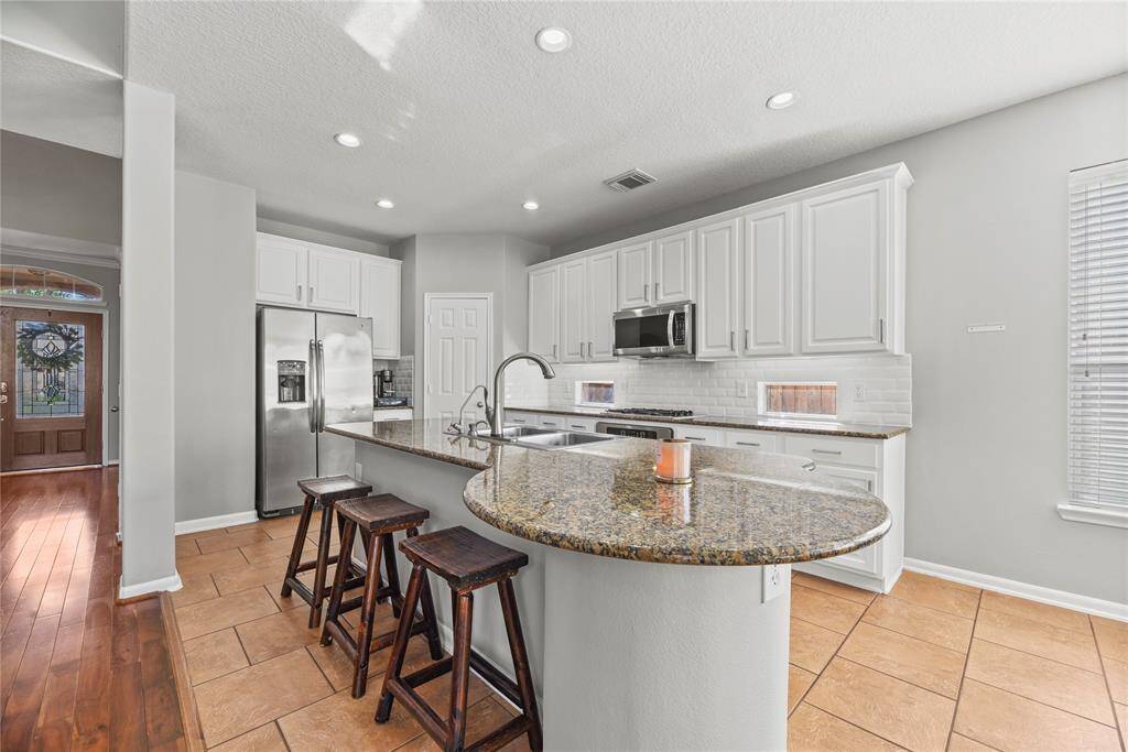 White subway tile in a kitchen backsplash offers a clean, timeless look that adds bright, classic charm and pairs effortlessly with any style of décor.