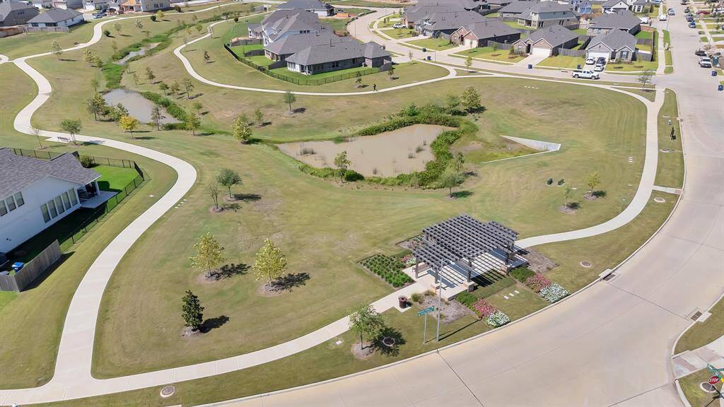 aerial view of the street leading to the home