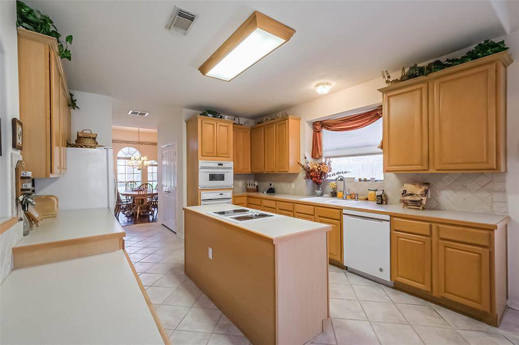 Plenty of counter space makes food preparation easy, and a delight for entertaining.