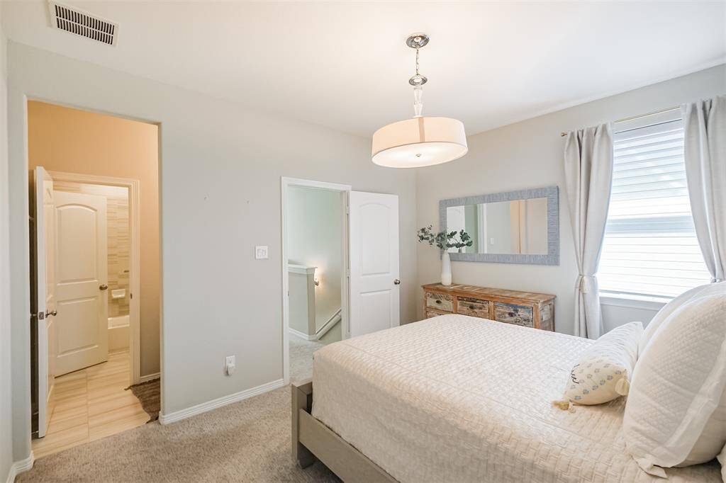 The first of three secondary bedrooms on the second floor with Jack and Jill bathroom.