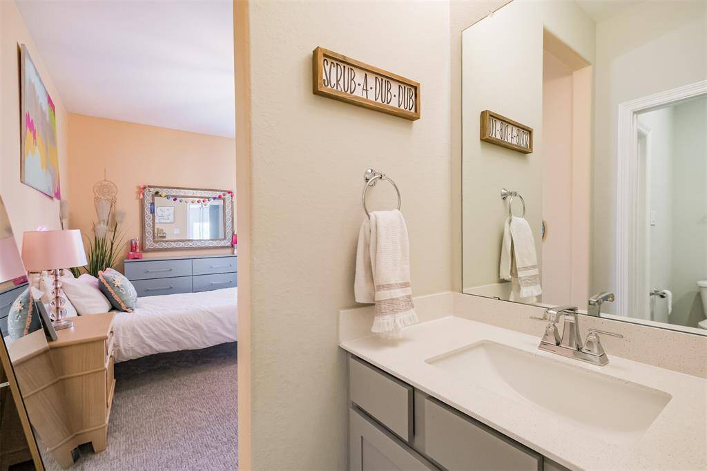 The Jack and Jill bathroom connects through to the 2nd secondary bedroom upstairs.