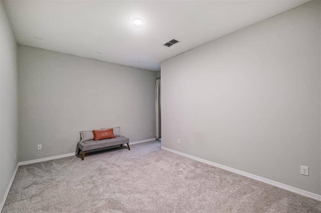 This super media room is prewired for sound/media equipment and ready for you to make your own in-house theater.