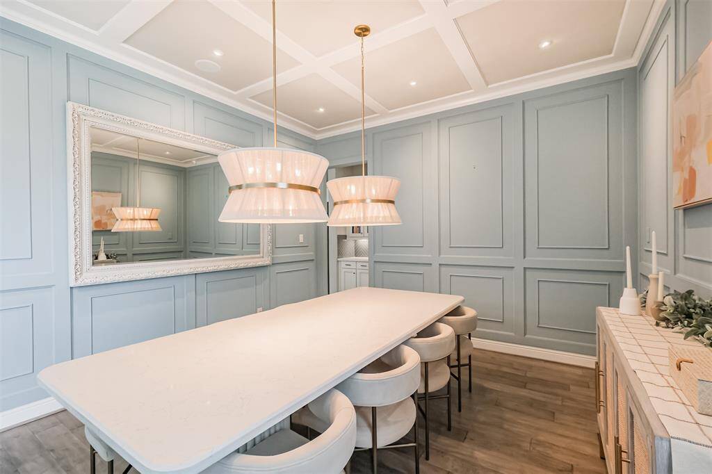 The dining room is situated to the right of the entryway and has direct access to the kitchen.