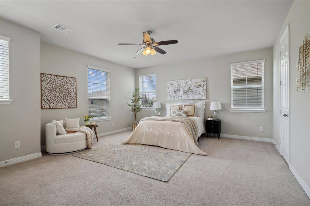 Luxurious primary bedroom.