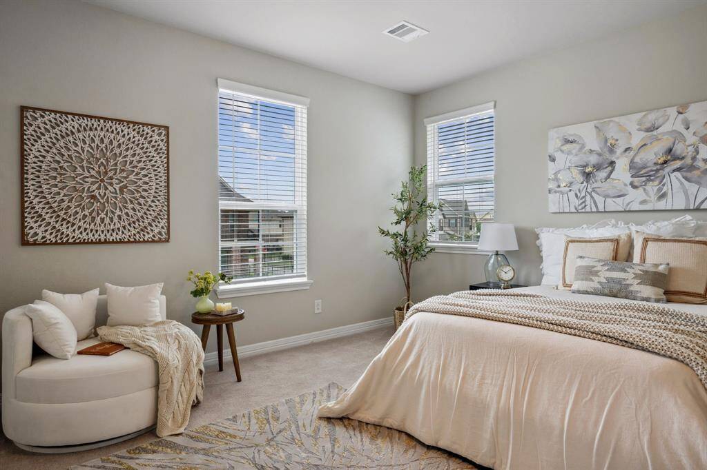 Luxurious primary bedroom.