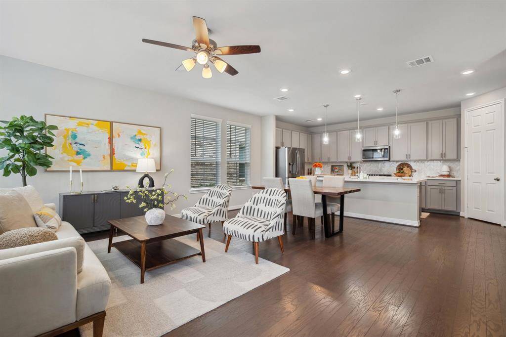 Spacious living room with an adjoining dining area.