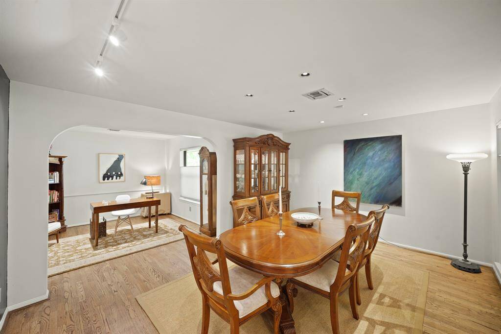 The Dining Area has an Open Concept Floorplan with the Office.  Halogen Track Lighting is also offered in the Dining Area.