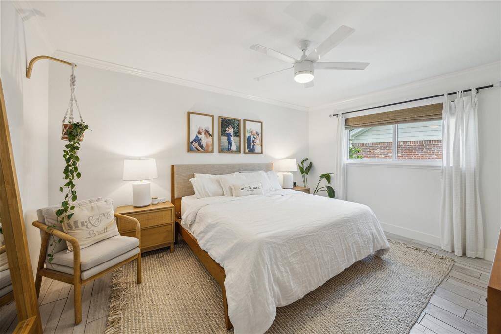 Primary suite with crown molding.