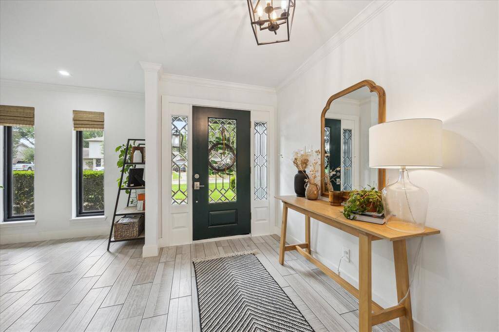 Inviting entryway to the light, bright and open floor plan. Welcome home!