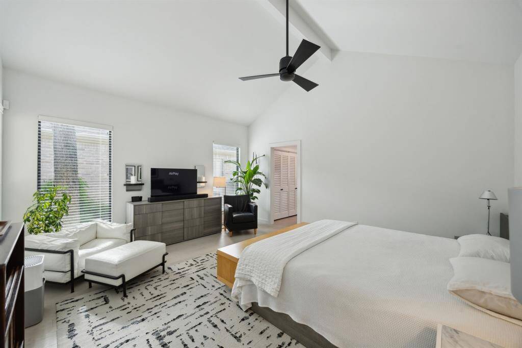 Another view of the primary suite with space for a sitting area.