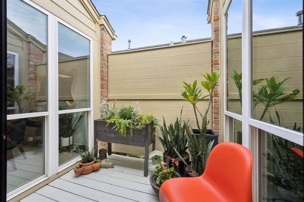 Patio space with plenty of room for a garden and an outdoor seating area.