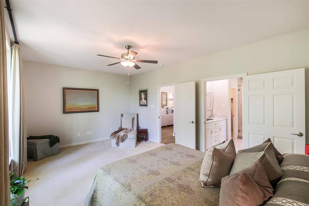An additional view of the first-floor primary suite. Generously sized to accommodate a sitting area.