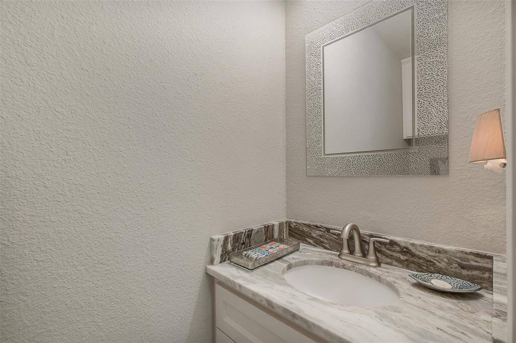 En-suite half-bathroom.