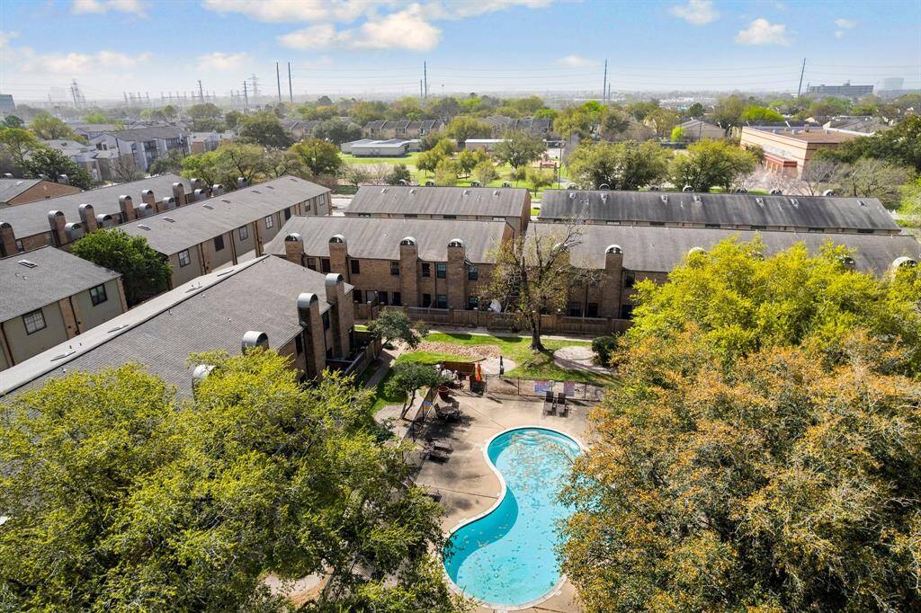Relax and unwind in this sparkling community pool, surrounded by lush greenery—your own oasis just steps from home.