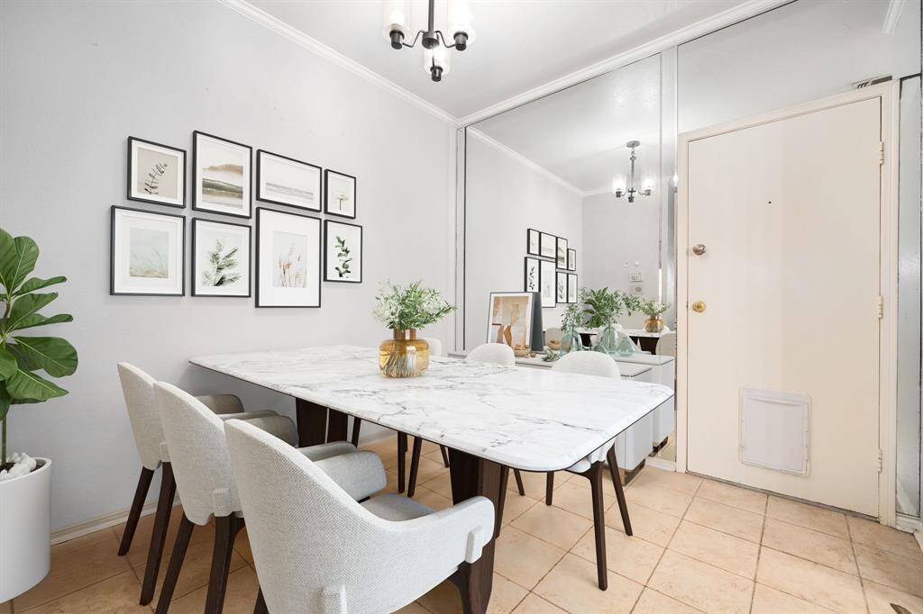 Enjoy intimate meals in this bright and airy dining space, enhanced by a mirrored wall that adds a touch of elegance and amplifies natural light. *Virtually Staged