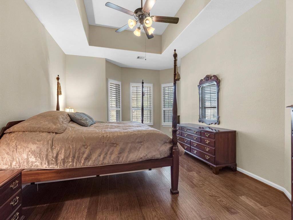 Primary bedroom has upgraded bay window for additional square footage. Great for a sitting area!