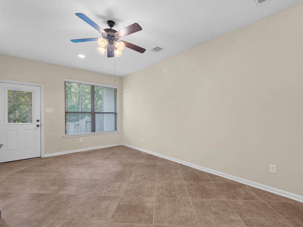 Flex area on the first level is perfect for a game room, gym, or office