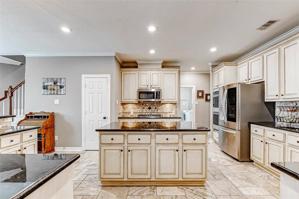 Spacious kitchen island ideal for meal prep and entertaining.