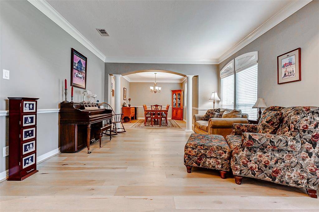 Elegant formal living room immediately to the right upon entry.