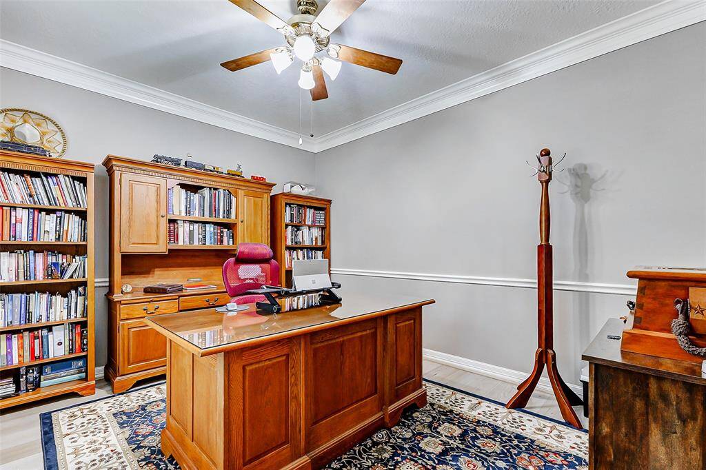 Private office set off the entry with French doors.