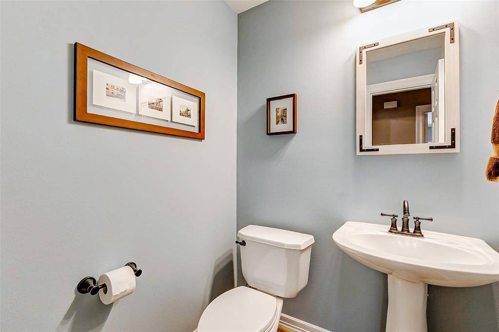 Convenient downstairs guest half bath.
