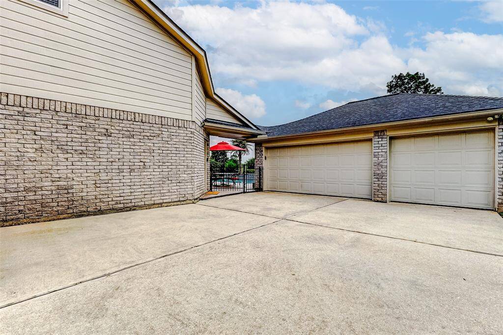Spacious three-car detached garage for all your storage and parking needs.