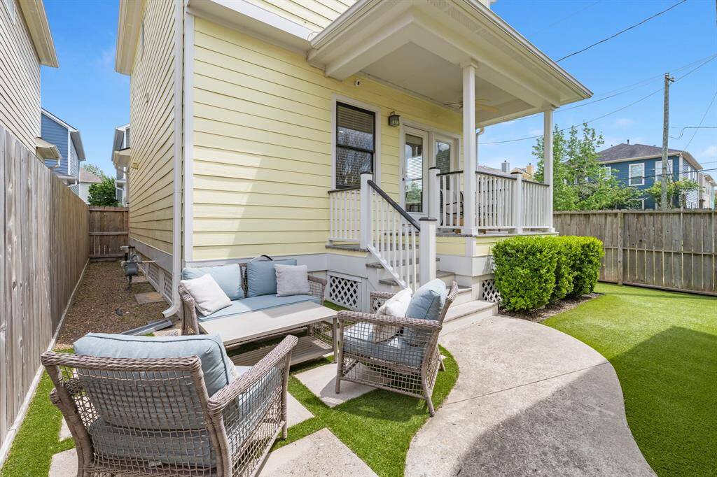 Additional patio area just of the back porch.  Artificial turf yard so low maintenance in the back and side yard.