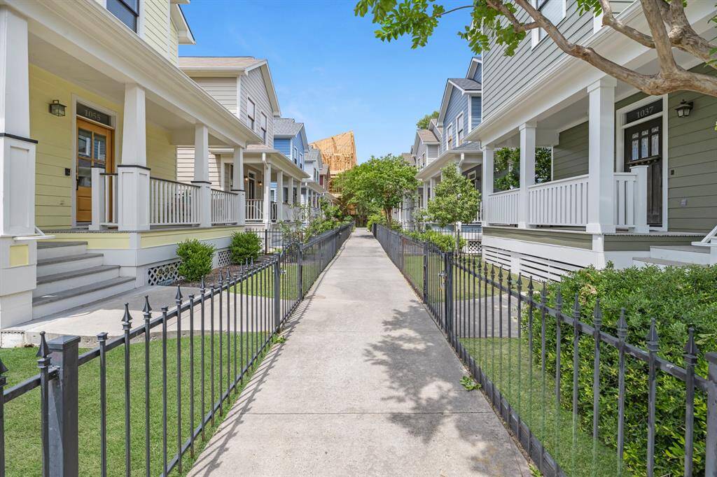 Gated walk way to the homes and each home is separately fenced