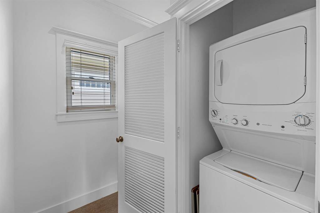 Stack washer and dryer combination remain with the home.  On second floor with the bedrooms