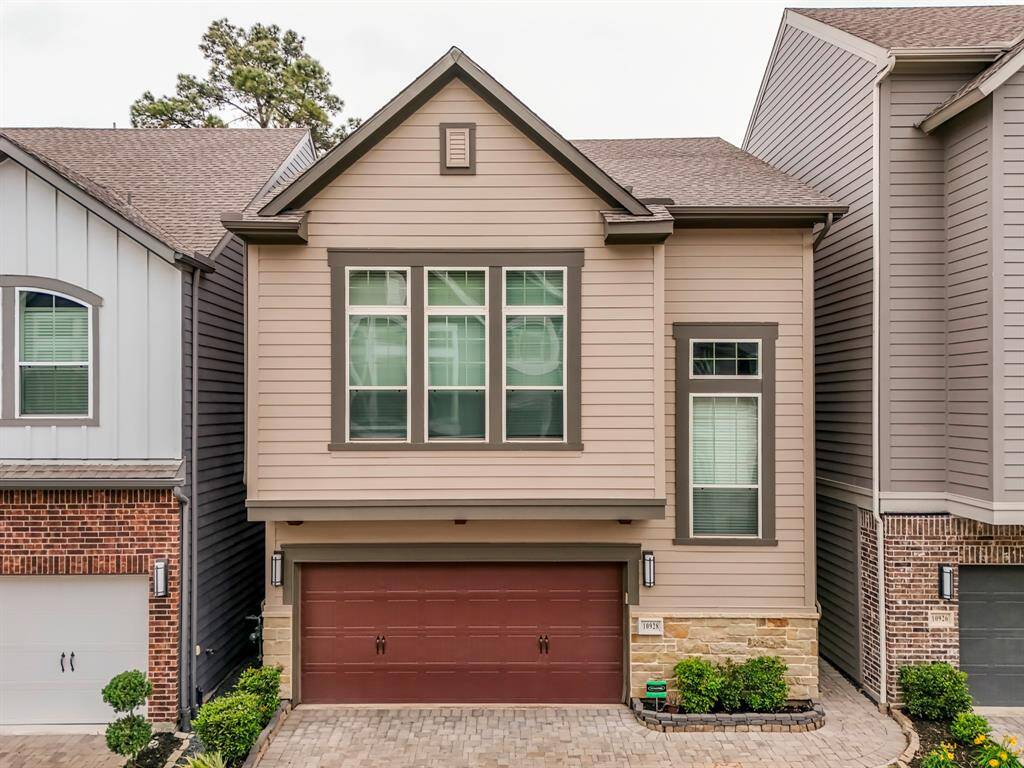 Welcome to 10928 Brambling Wood, a modern, two-story townhouse-style single family home. Featuring large windows, stone accents, and a neatly paved driveway with small landscaped areas, this home will win you over.