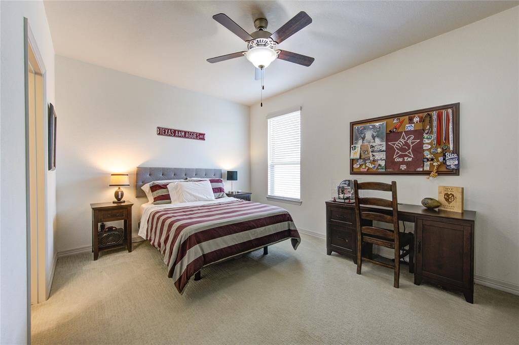 Bedroom #4 offers versatile space for a desk or cozy sitting area.