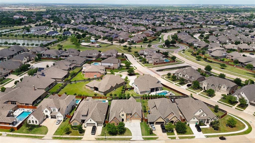 Experience a welcoming community enhanced by lush greenery in the beautiful Towne Lake Subdivision.