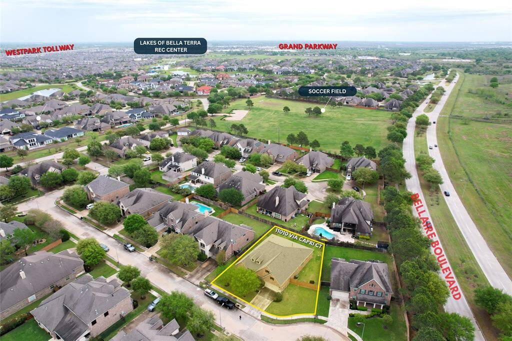 Community aerial highlighting neighborhood layout and access points