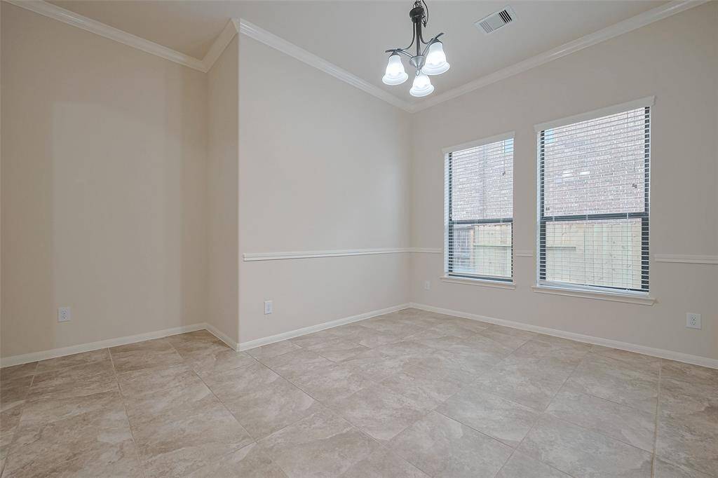 Large formal dining, light and bright steps from the kitchen!