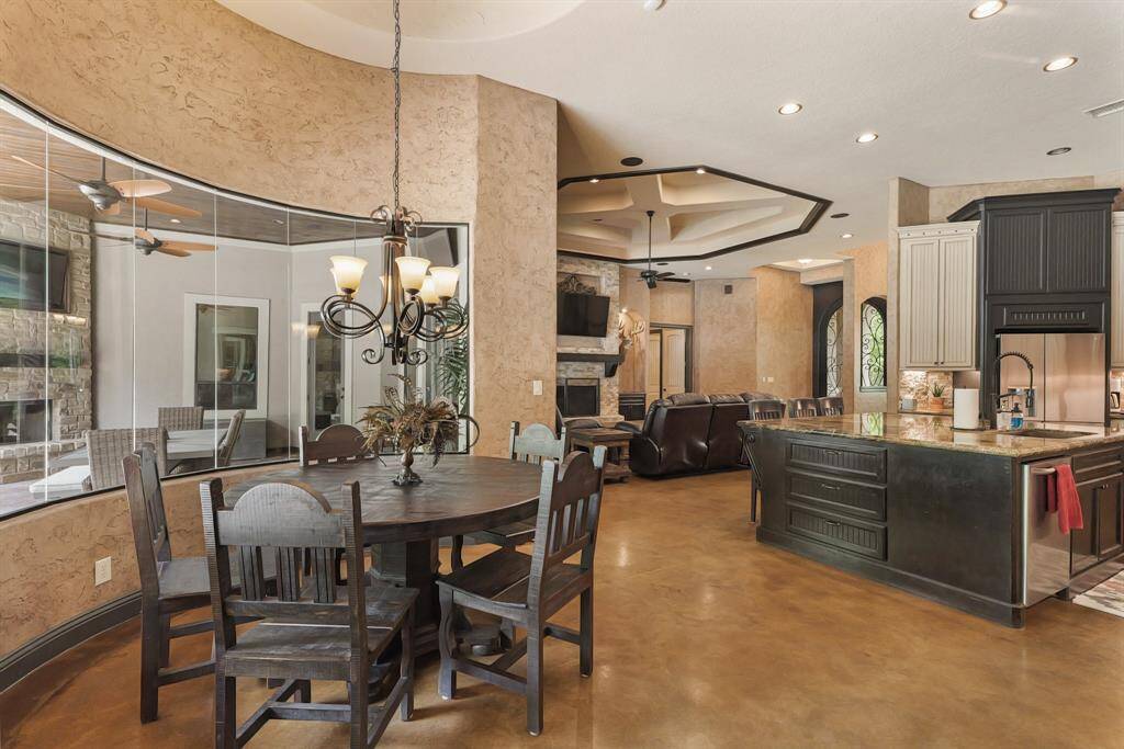Enjoy breakfast with a view in this inviting bay window nook, perfect for starting your day.