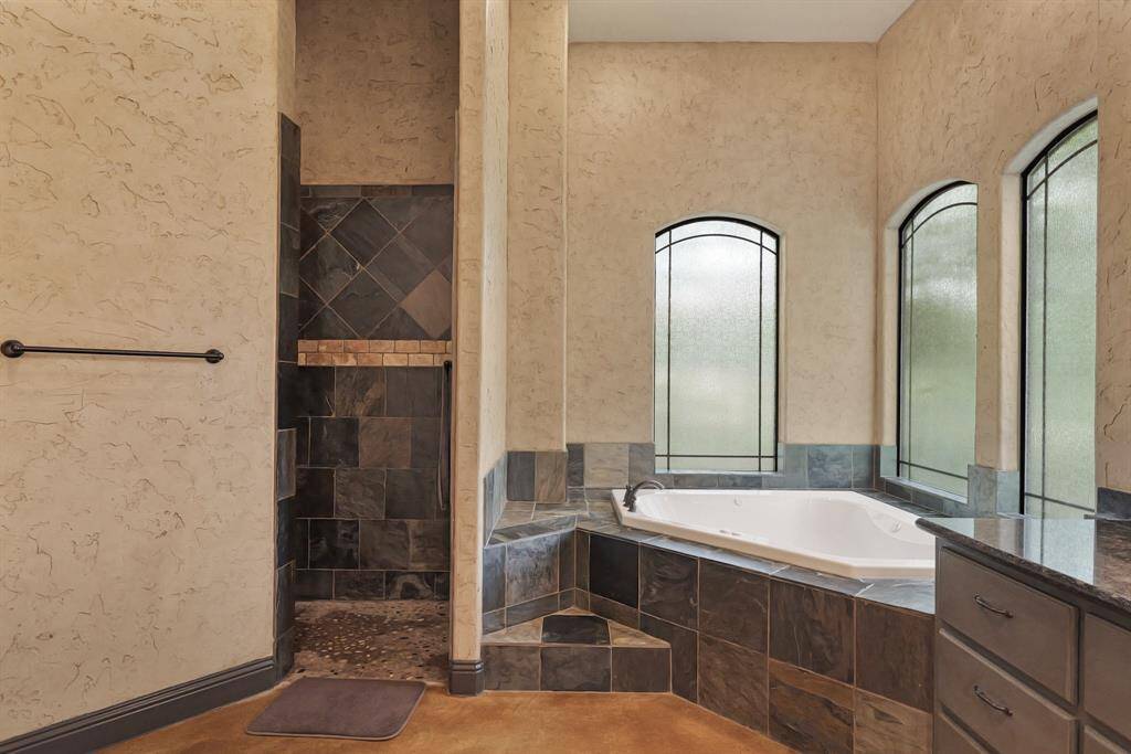 Luxurious Jacuzzi tub for ultimate relaxation.