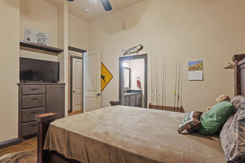 Cozy second bedroom with ample storage and convenient en-suite access.