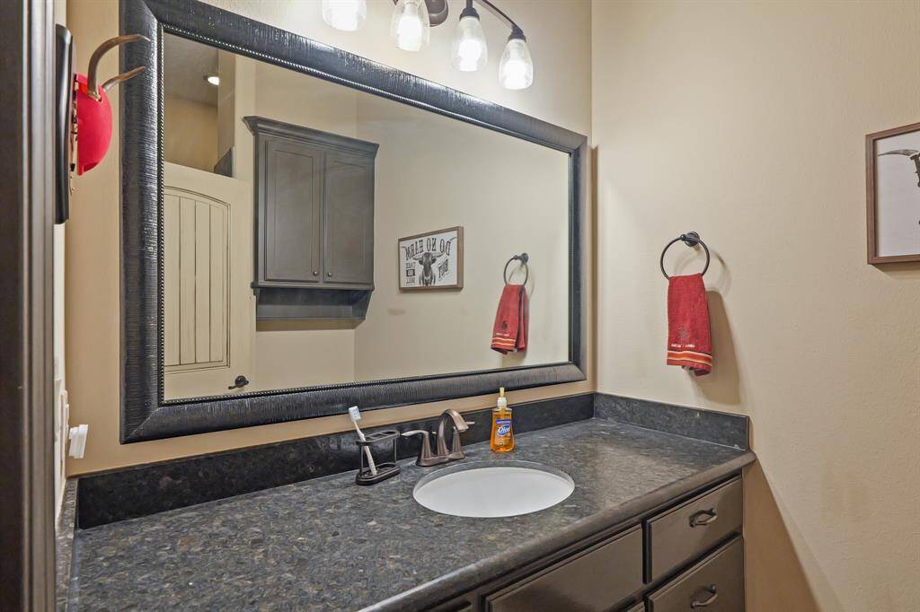 Luxurious en suite bathroom featuring a modern stand-up shower for the secondary bedroom.