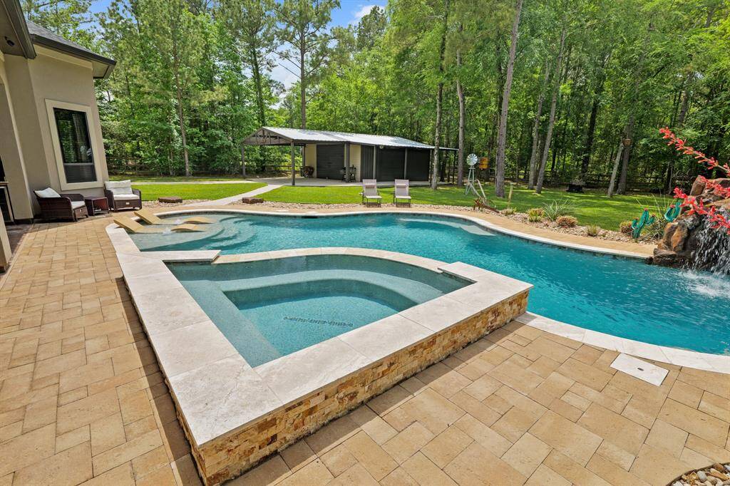Enjoy year-round relaxation with a heated pool and spacious 10-person jacuzzi!