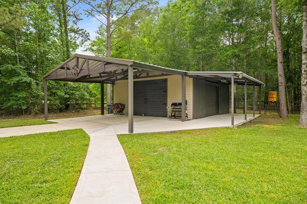 Charming 26x26 barn/workshop featuring a covered gable, perfect for projects and storage.