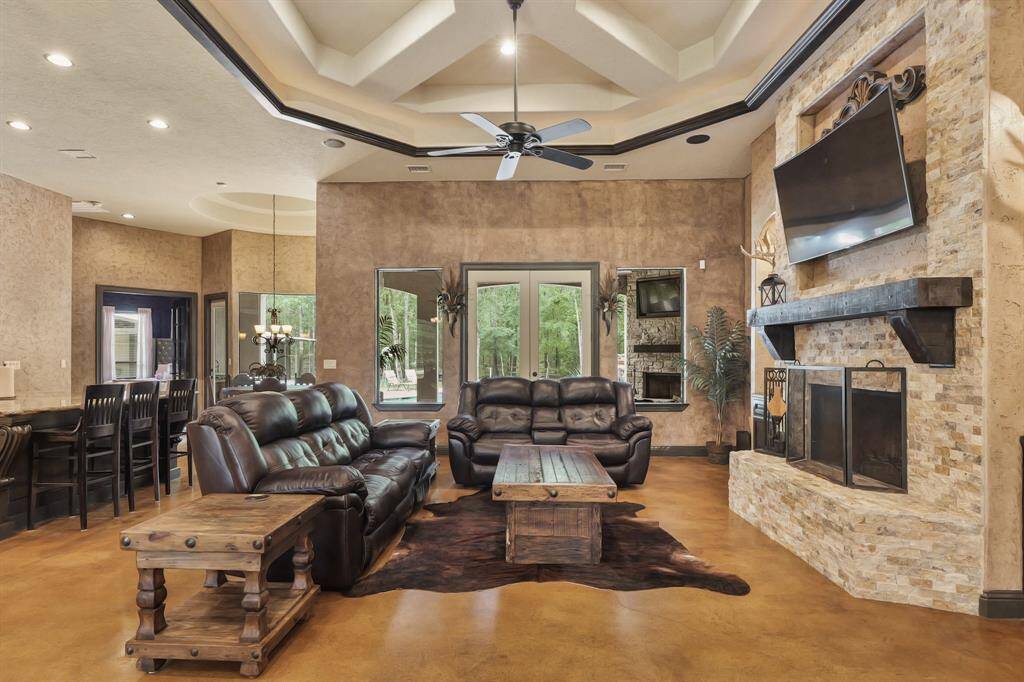Cozy wood-burning fireplace adds warmth and charm.