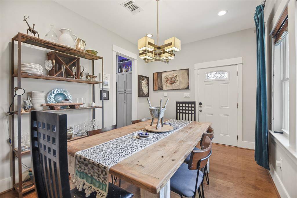 The dining room is at the rear of the home and thedoor to the backyard is immediately adjacent.