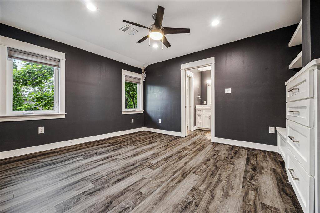 Here is the third bedroom upstairs with built insand custom paint that makes the trim pop!